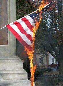 The flag of the United States being burned